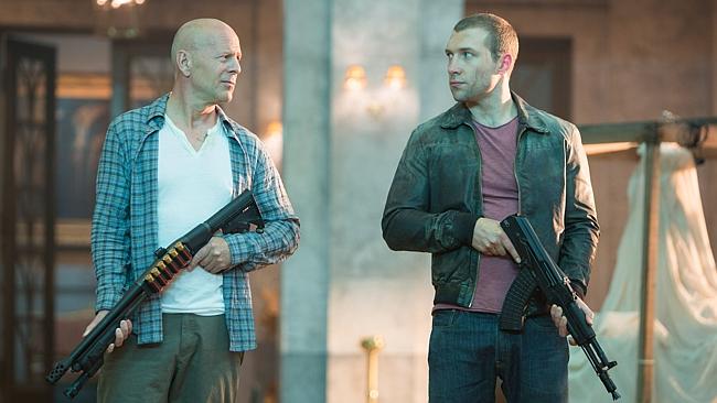 Bruce Willis and Jai Courtney in a scene from the movie Good Day to Die Hard.