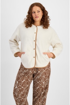 Cameron (She/Her) wears size L and is 179cm tall with 91cm chest and 74cm waist