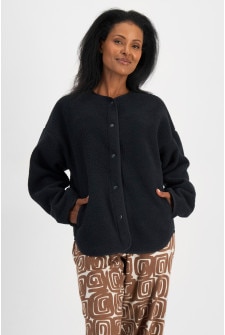 Senait (She/Her) wears size S and is 162cm tall with 79cm chest and 60cm waist