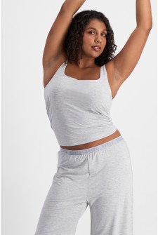 Camryn (She/Her) wears size S and is 106cm tall with 95cm chest and 74cm waist