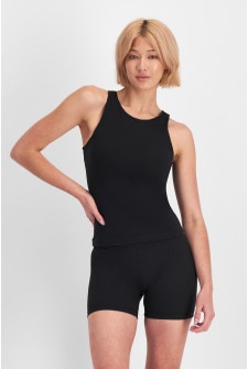 Rhiannan (She/Her) wears size 10 and is 175cm tall with cm chest and cm waist