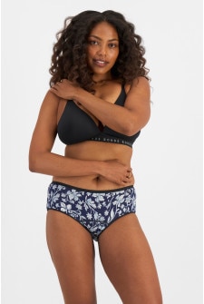 Camryn (She/Her) wears size 10 and is 106cm tall with 95cm chest and 74cm waist