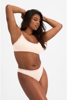 Camryn (She/Her) wears size 10 and is 106cm tall with 95cm chest and 74cm waist