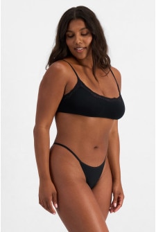 Camryn (She/Her) wears size 10 and is 177cm tall with 95cm chest and 74cm waist