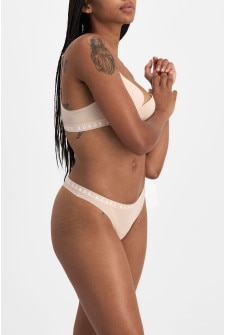 Model wears size 10, is 170cm tall with 84cm bust and 64cm waist