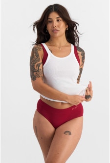 Camryn (She/Her) wears size 10 and is 106cm tall with 95cm chest and 74cm waist