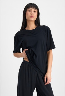Nancy (She/Her) wears size S and is 170cm tall with 82cm chest and 64cm waist