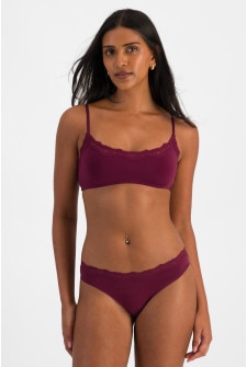 NAYA (She/Her) wears size 10 and is 174cm tall with 80cm chest and 63cm waist