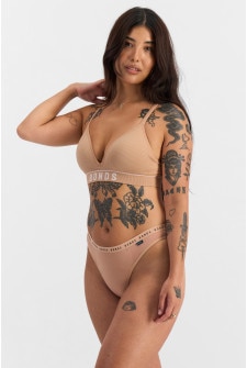 Bella (She/Her) wears size 14 and is 173cm tall with 95cm chest and 77cm waist