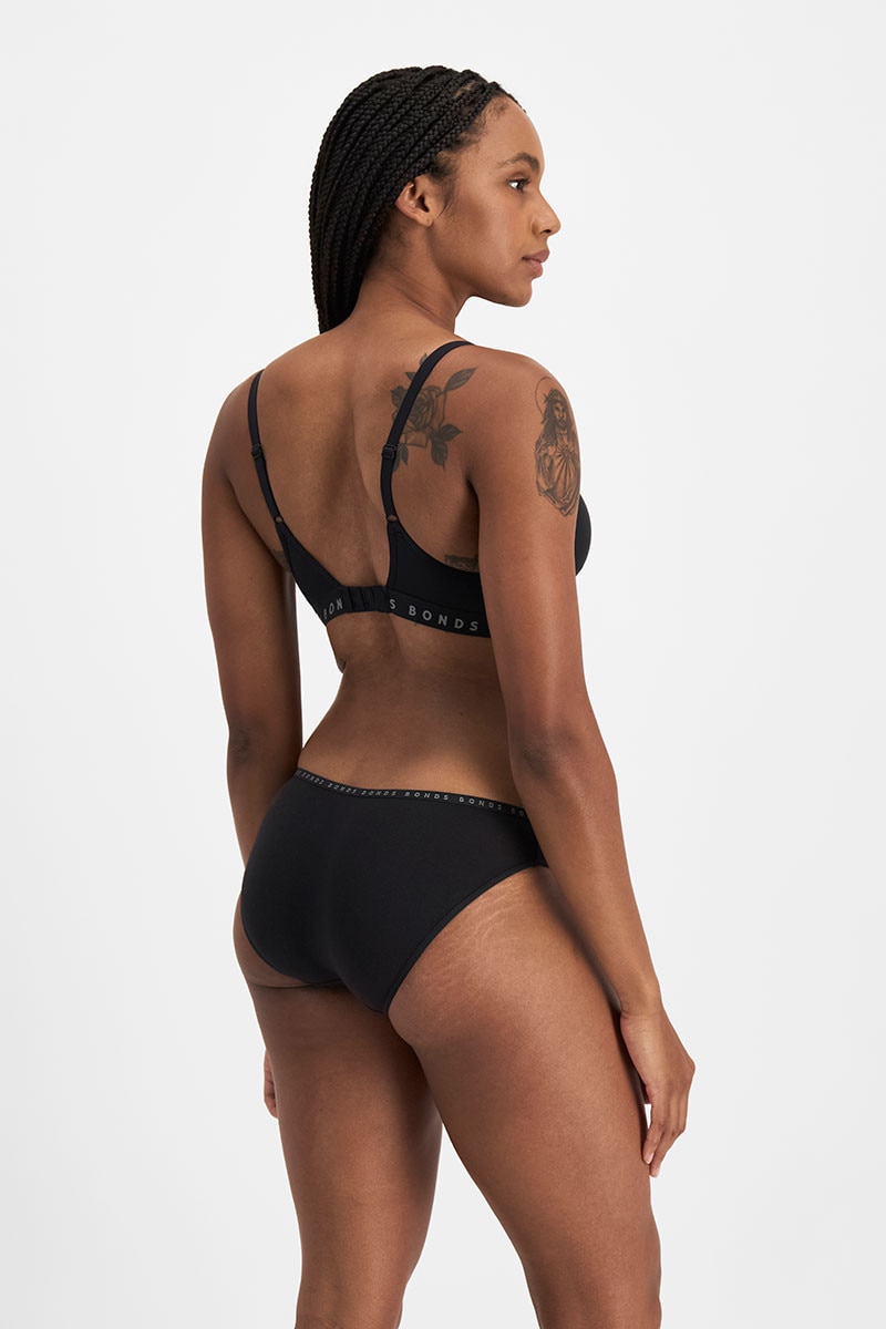 Tani (She/Her) wears size 12 and is 171cm tall with 74cm chest and 61cm waist