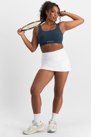 Camryn (She/Her) wears size S and is 106cm tall with 95cm chest and 74cm waist