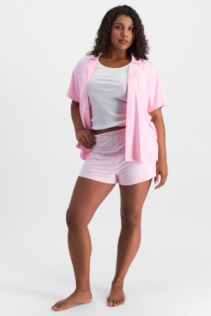 Camryn (She/Her) wears size S and is 106cm tall with 95cm chest and 74cm waist