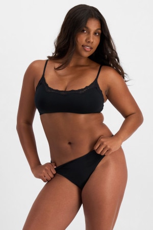 Camryn (She/Her) wears size 10 and is 106cm tall with 95cm chest and 74cm waist